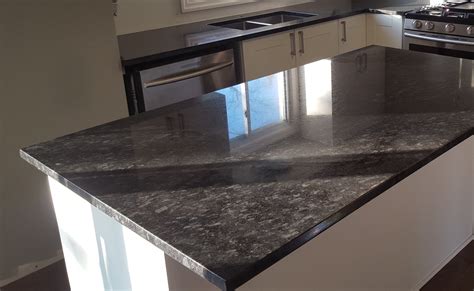 steel grey leathers granite with white cabinets|white leather granite countertop ideas.